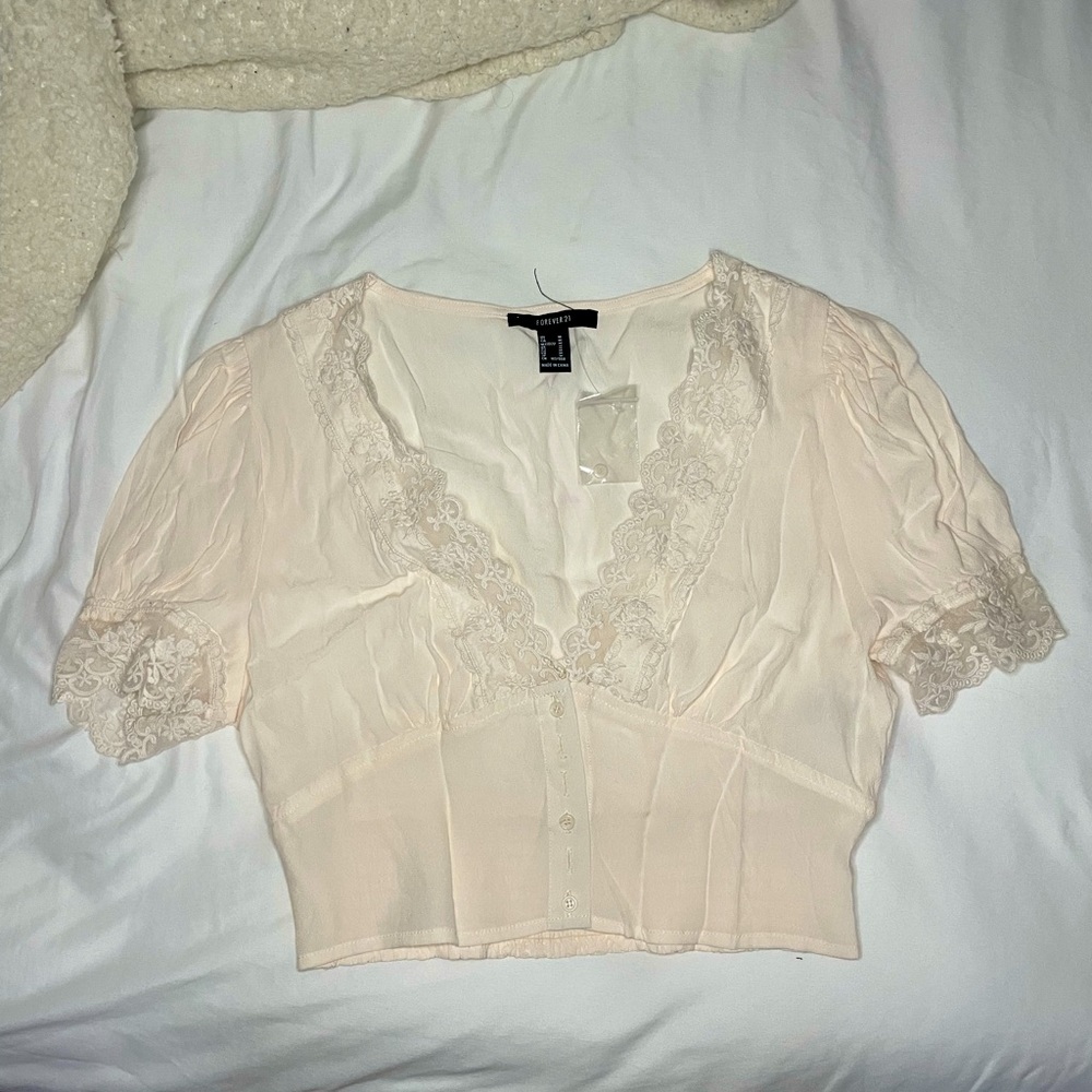 light peachy pink crop top